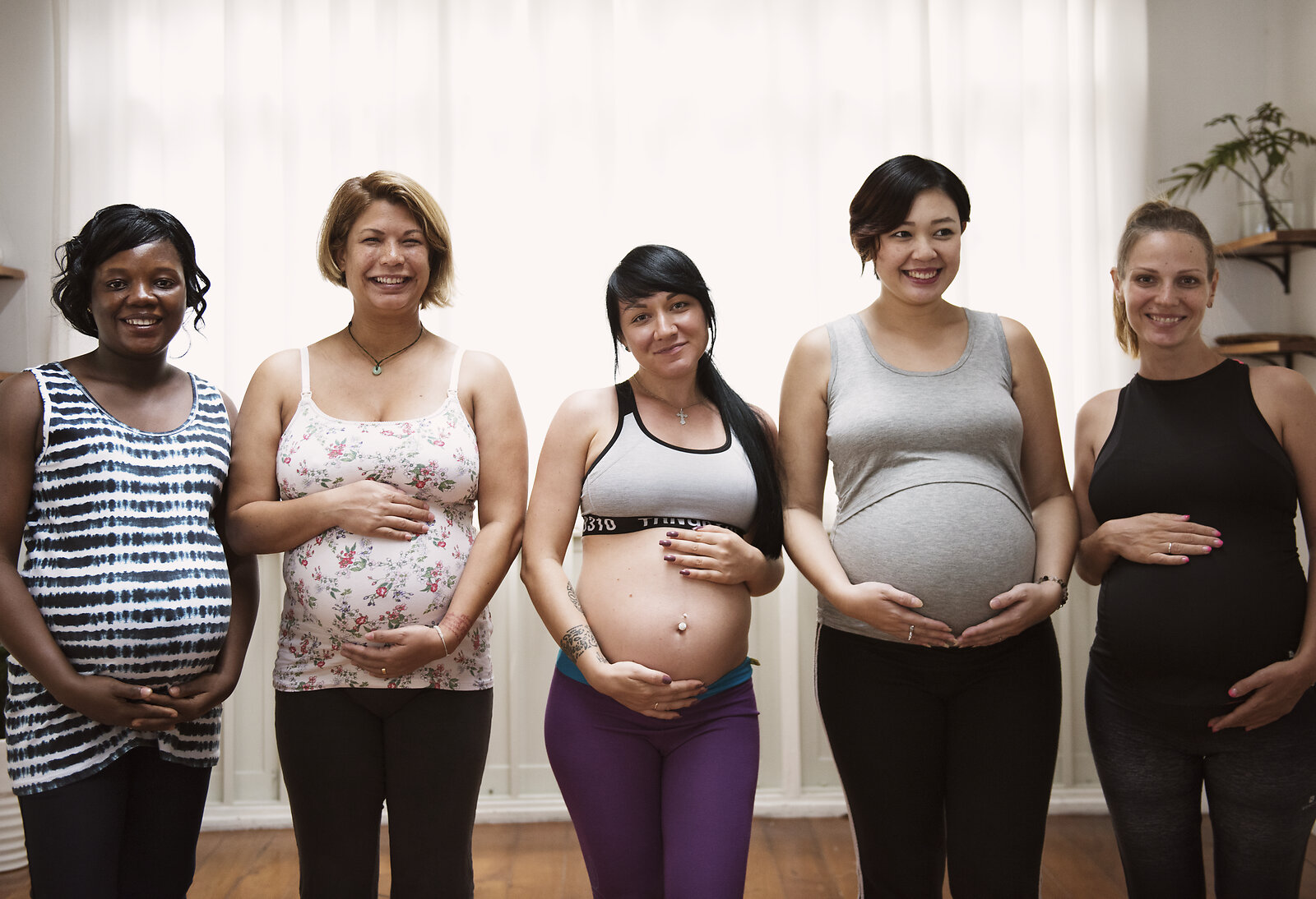 Pregnant women gathered in a perinatal mental health therapy group in Pasadena